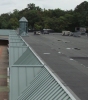 Gateway Villiage - mechanically fastened rubber & metal canopy roofing