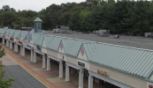 Gateway Villiage - mechanically fastened rubber & metal canopy roofing